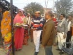 इकौना तहसील में आयोजित गोदभराई कार्यक्रम में मौजूद एसडीएम व अन्य।