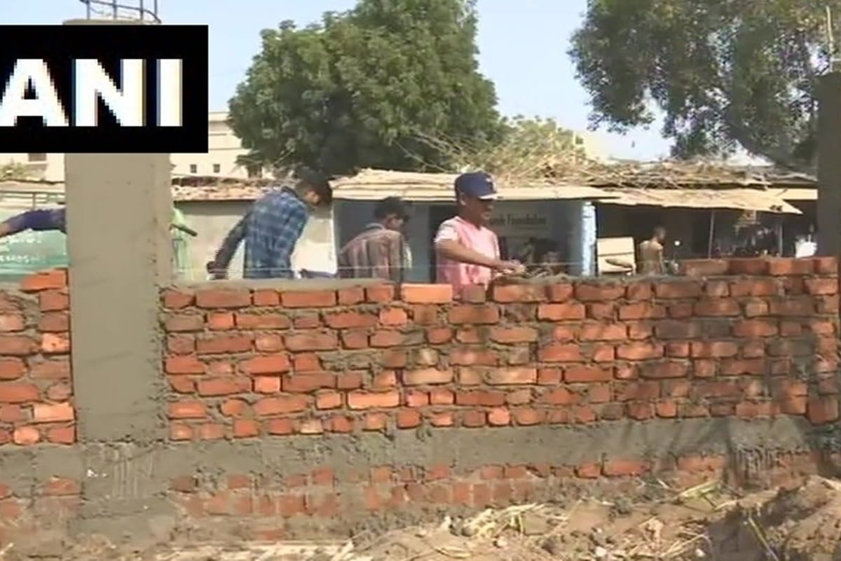 Gujarat civic body is building wall on route that would be taken by PM Modi and Donald Trump