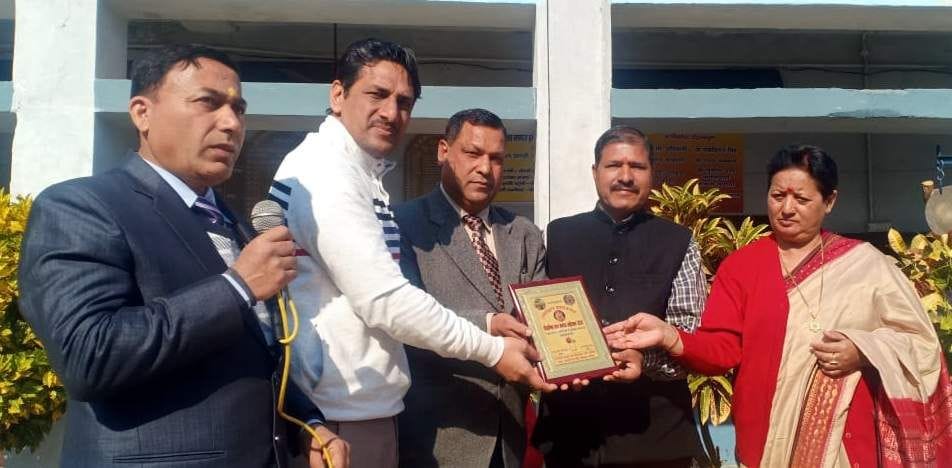 Teacher and meritorious student honored