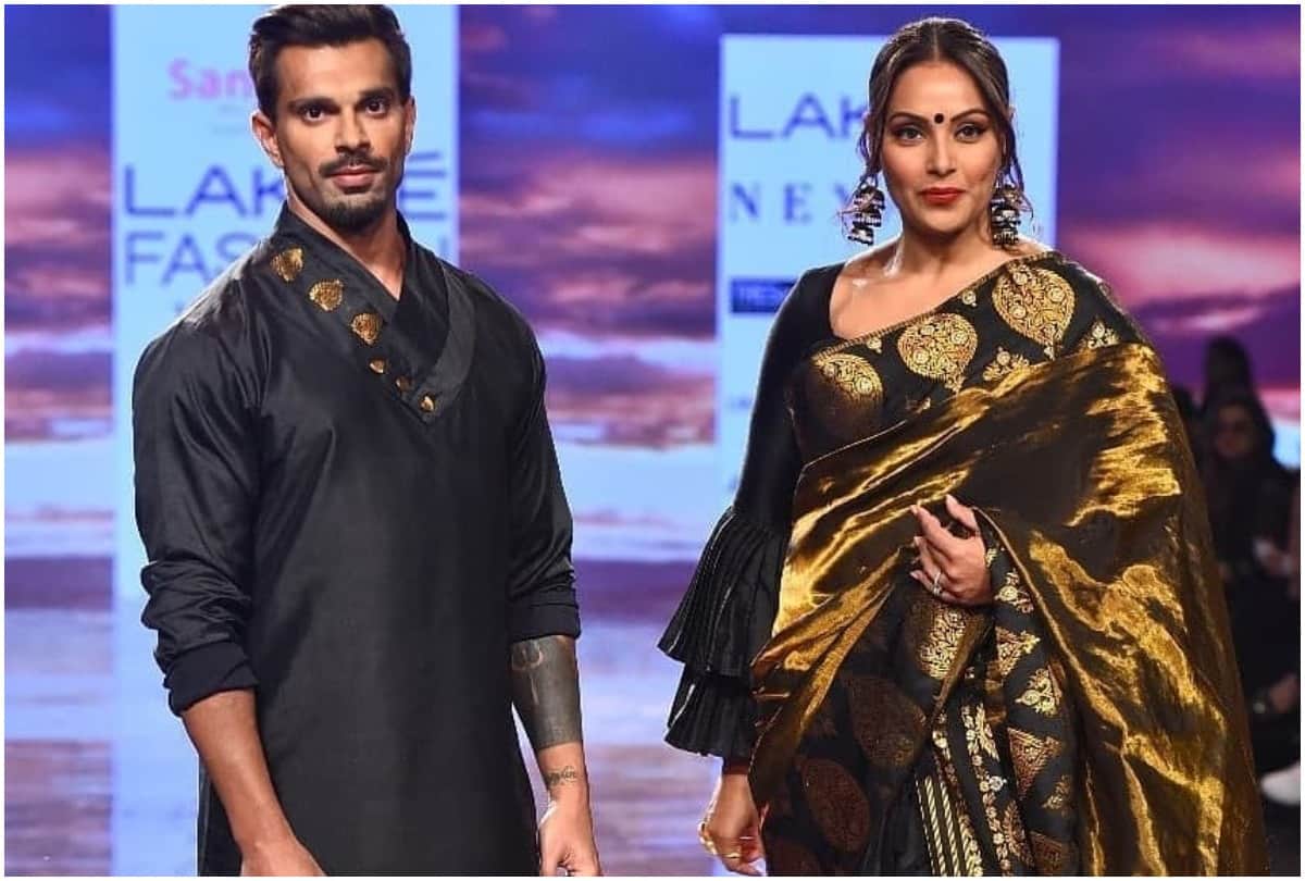 malaika arora flaunts her curvy waist in red lehenga in lakme fashion week 2020