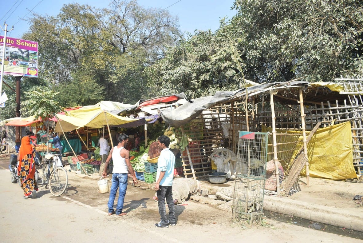 Vending zones in papers, handcart on pavements