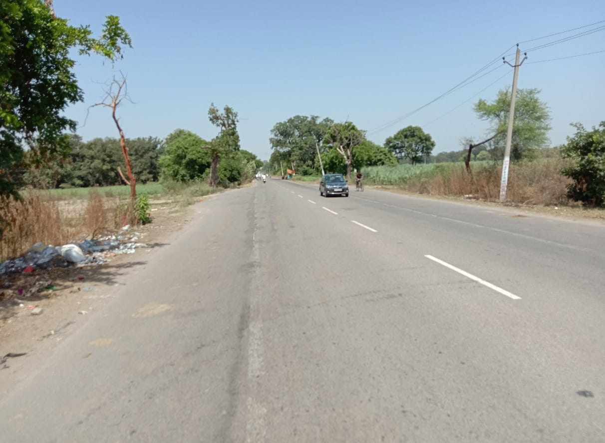 Pillars standing in the fields, widening of highway in air