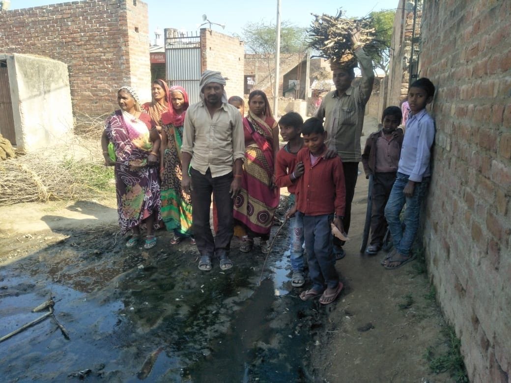 People of Hardoi village forced to pass through mud