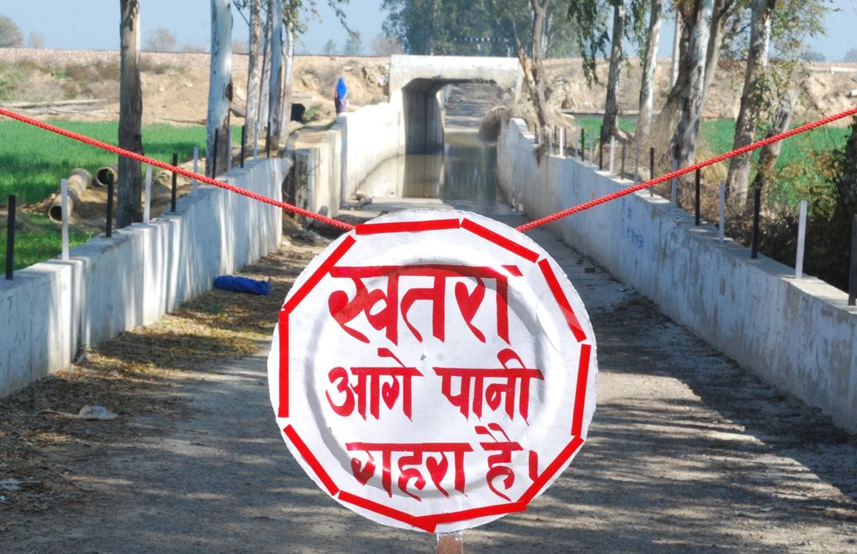 villagers did yoga by standing in water in the fury of water filled in the underpass