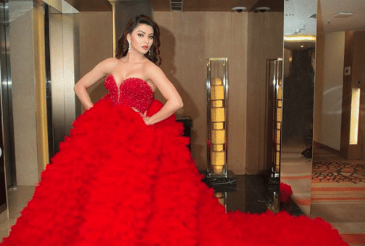 urvashi rautela wear red gown take 4 chairs users trolled