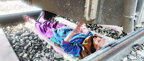 lying on track to commit suicide