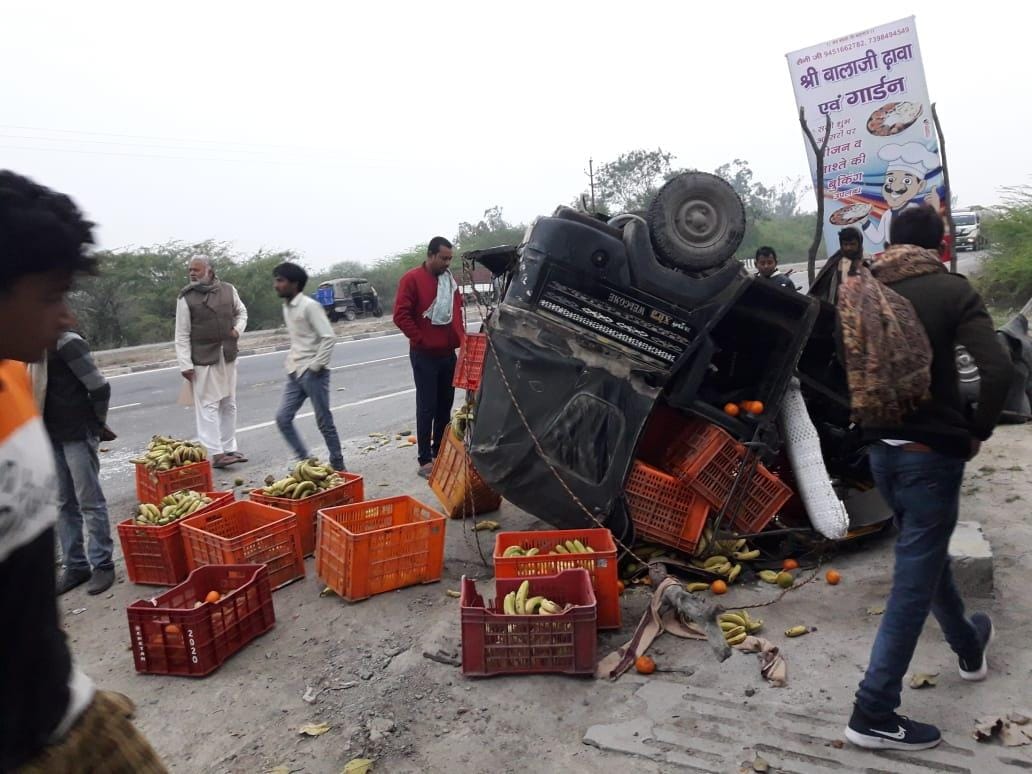 Auto overturns after hitting the truck, driver injured