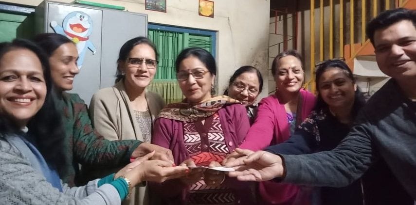 Art of Living members swing with Shiva hymns