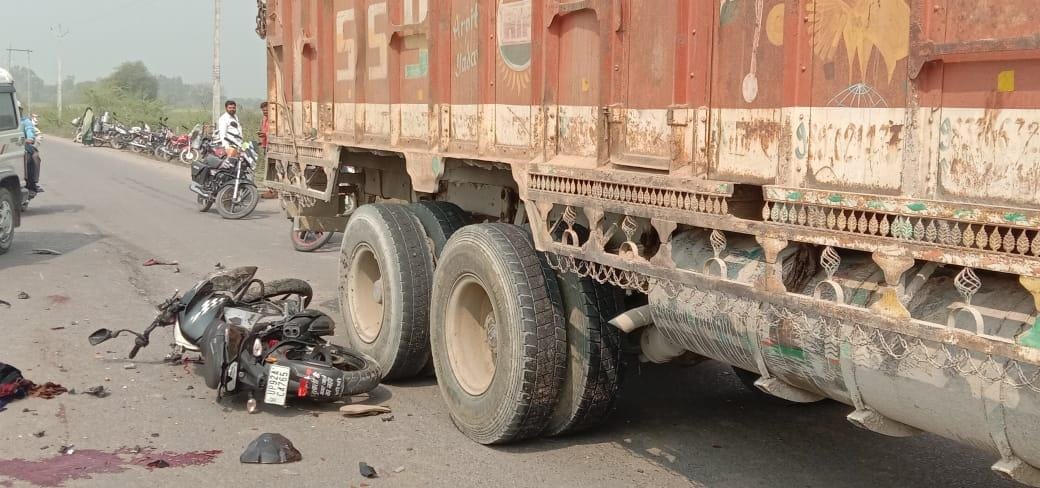 Truck collides with bike, two friends killed, third injured
