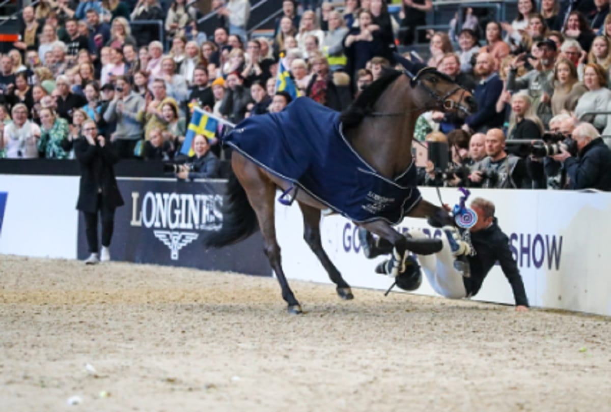 Geir Gulliksen wins first FEI World Cup at 60 years of age later thrown by horse in prize ceremony
