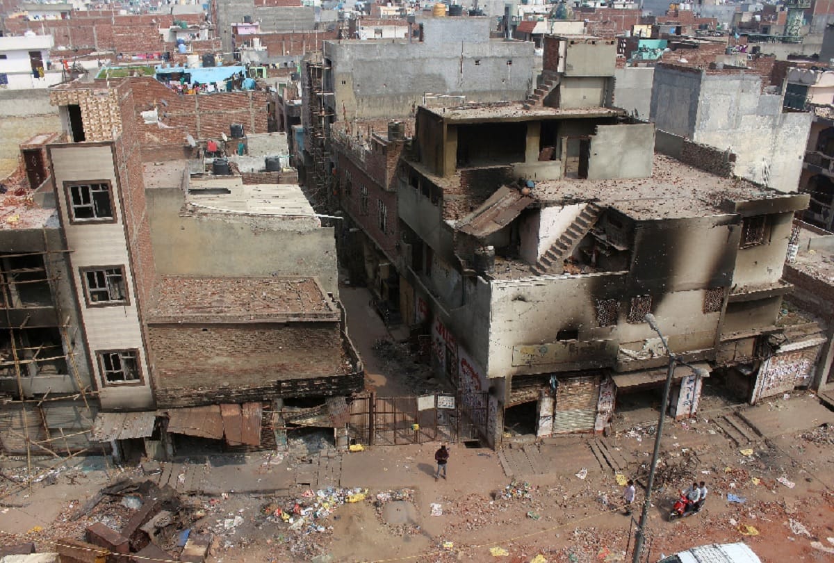 Burned shops broken roofs and rocky roads are telling the story of nuisance of Delhi Violence