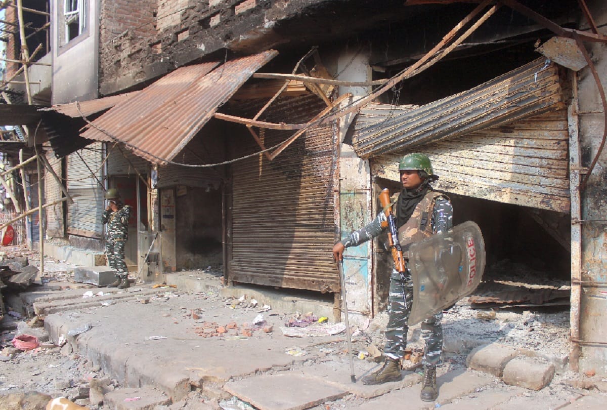 Burned shops broken roofs and rocky roads are telling the story of nuisance of Delhi Violence