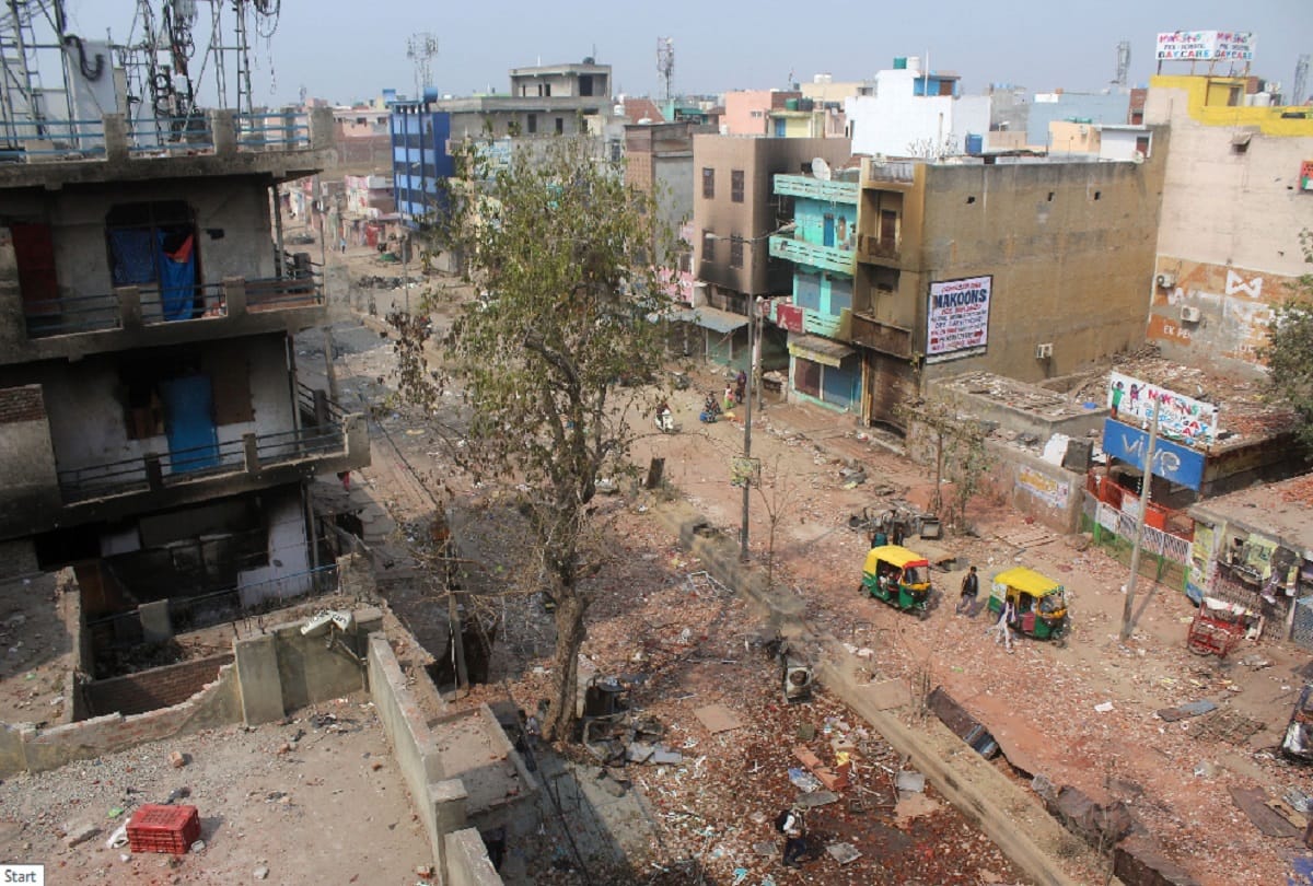 Burned shops broken roofs and rocky roads are telling the story of nuisance of Delhi Violence