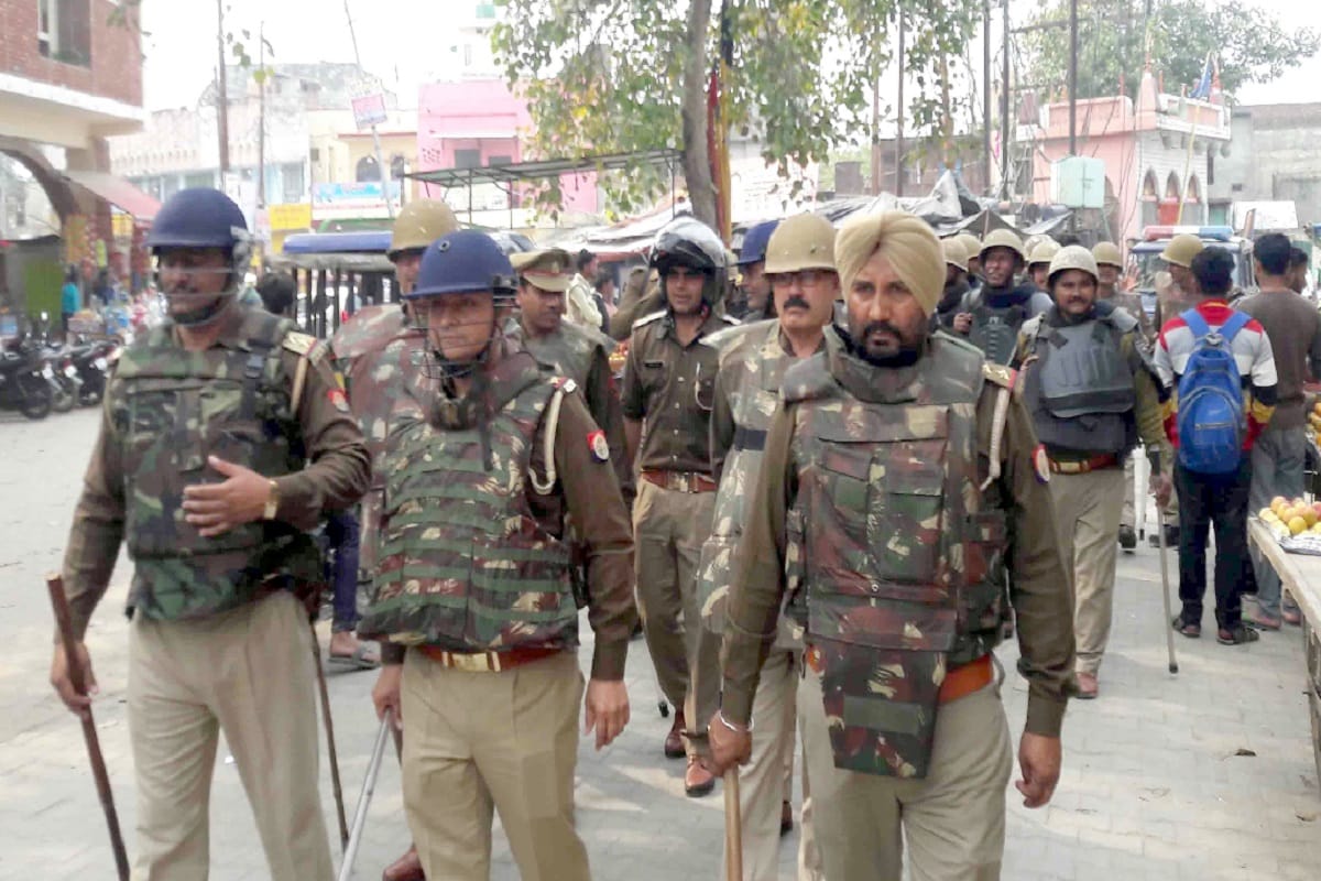 Police officers has alert in Bijnor district of Uttar Pradesh due Delhi violence
