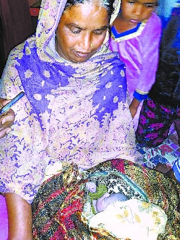 Newborn thrown after birth .. The childless couple adopted