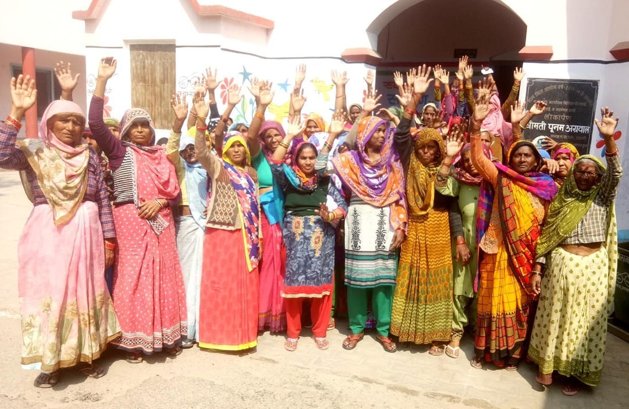 women protest for grant money