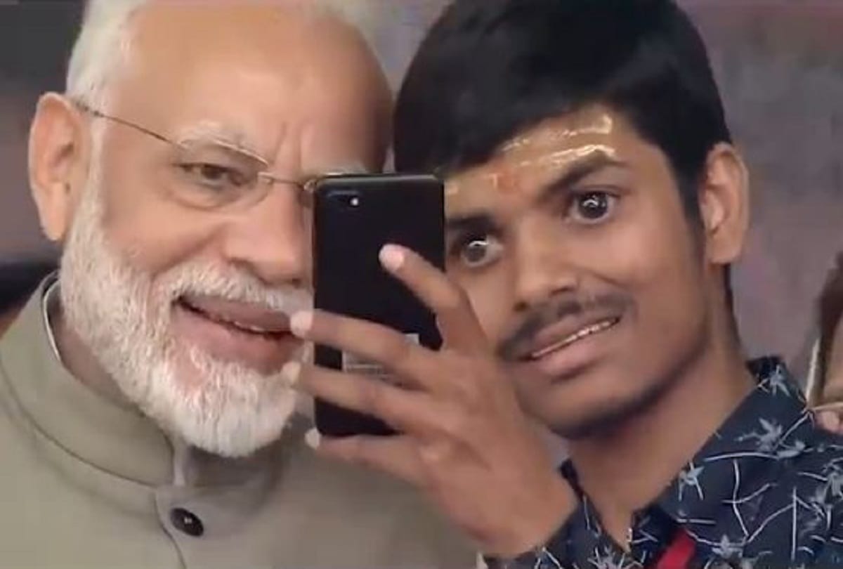 PM Modi in Prayagraj takes selfie with blind Vivek Mani and asks to send on whatsapp