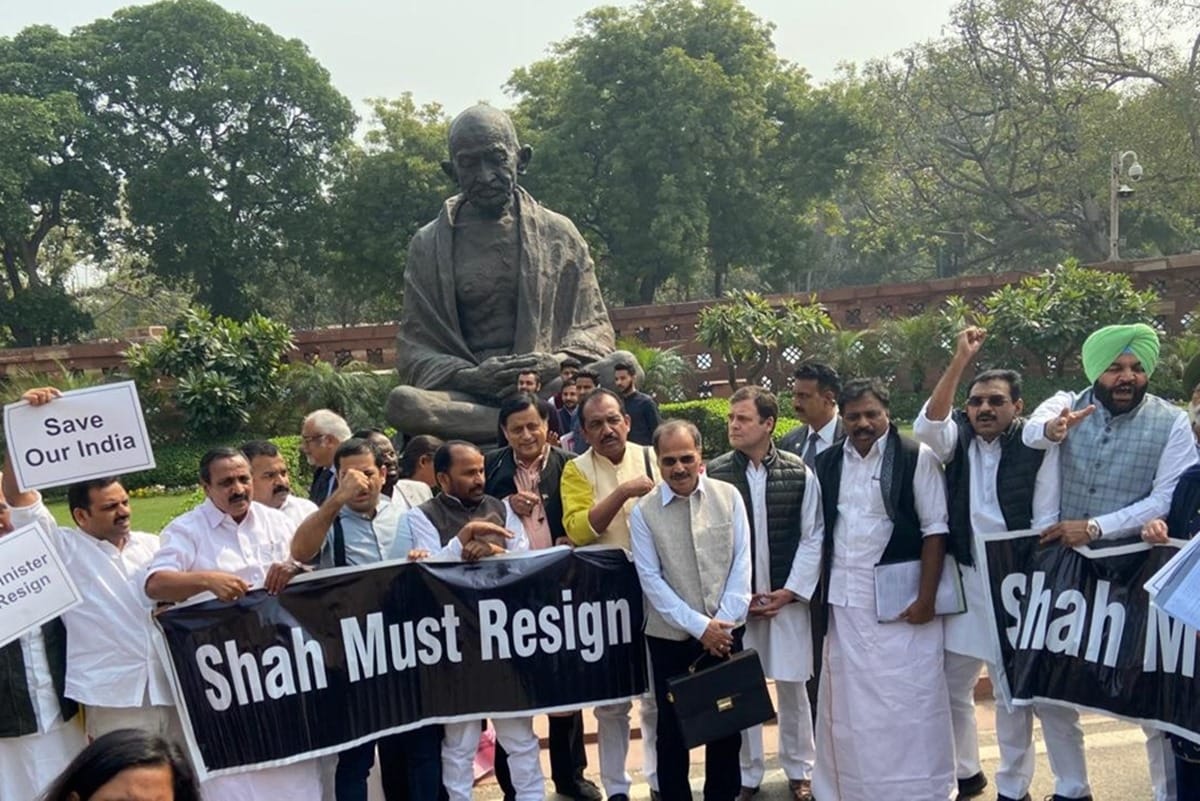 Parliament congress mps protest against govt over delhi violence raise shah must resign slogans