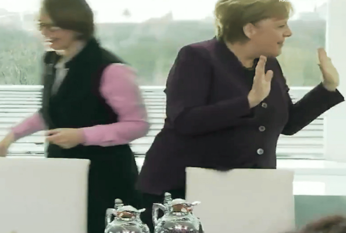 coronavirus effect german home minister rejects proposal to hand shake of chancellor video viral