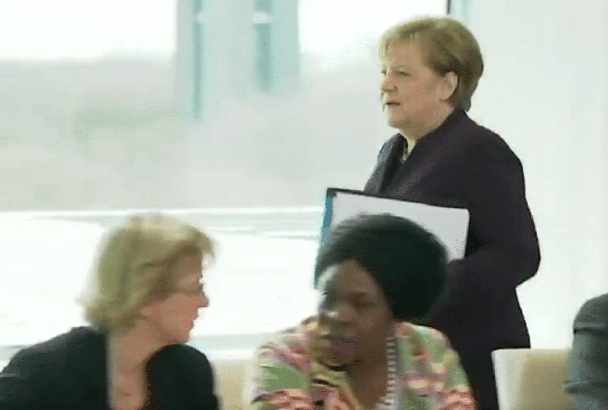 coronavirus effect german home minister rejects proposal to hand shake of chancellor video viral