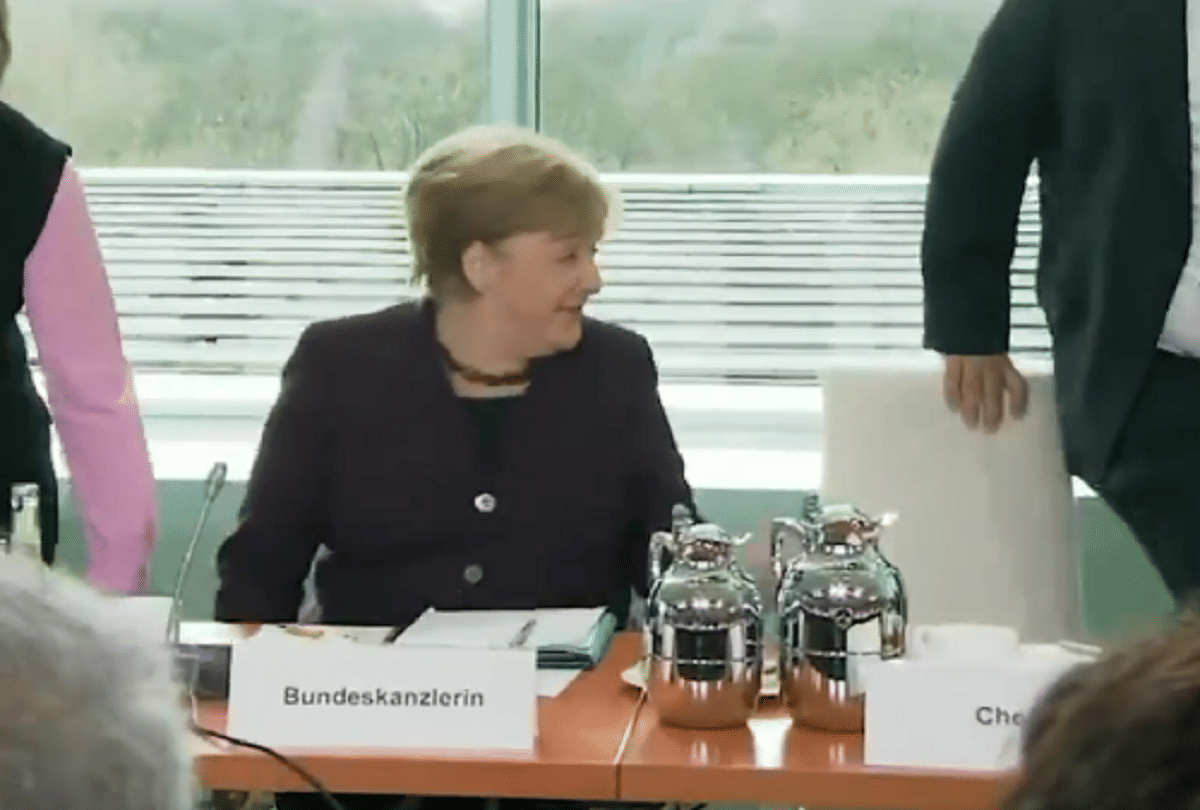 coronavirus effect german home minister rejects proposal to hand shake of chancellor video viral
