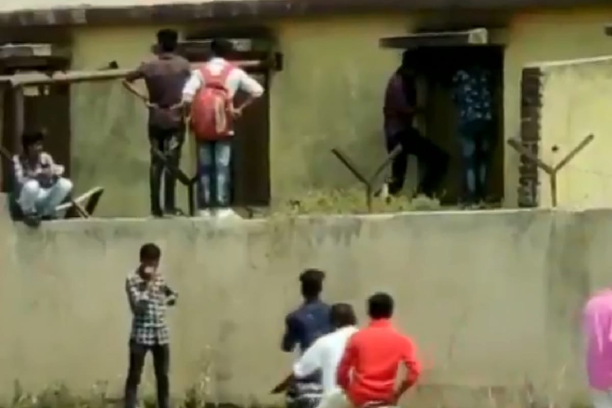 Maharashtra 10th exam cheating viral video, people seen jumping school wall and providing chits