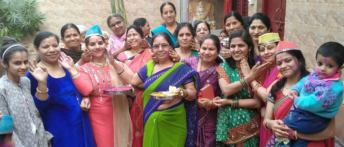 The women shouted colors by singing Holi songs