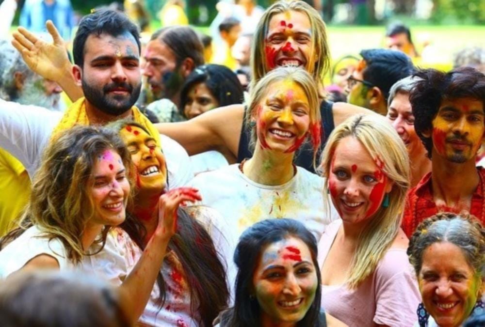 International yoga festival 2020: Foreigners Play Holi With Gulal with Yoga