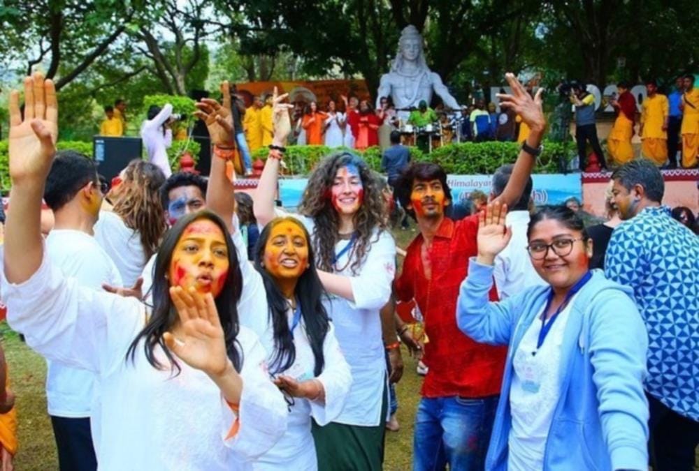 International yoga festival 2020: Foreigners Play Holi With Gulal with Yoga