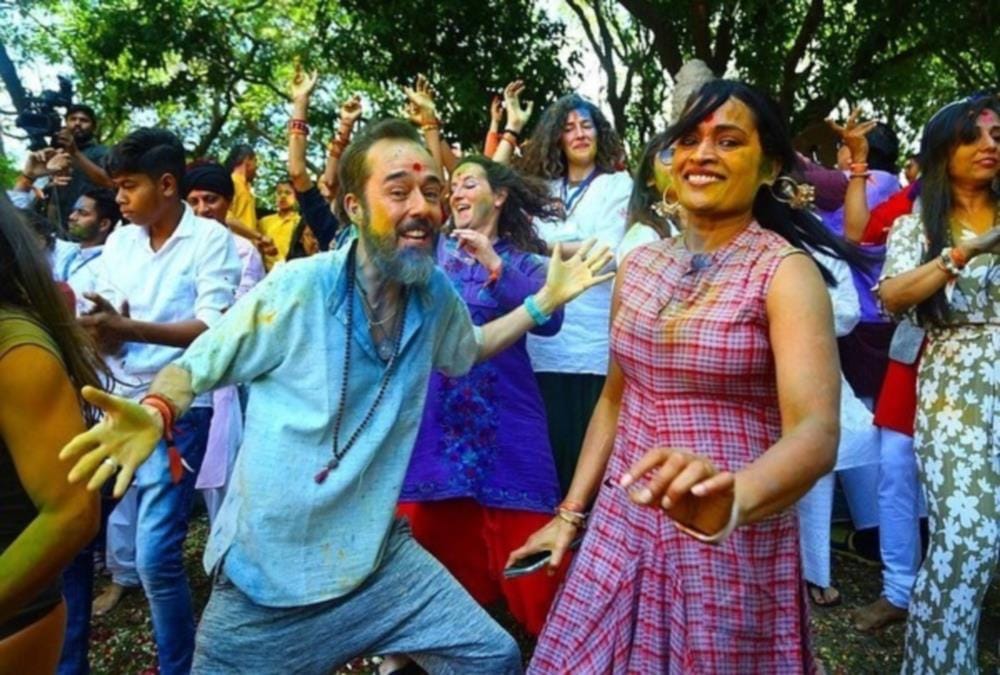 International yoga festival 2020: Foreigners Play Holi With Gulal with Yoga