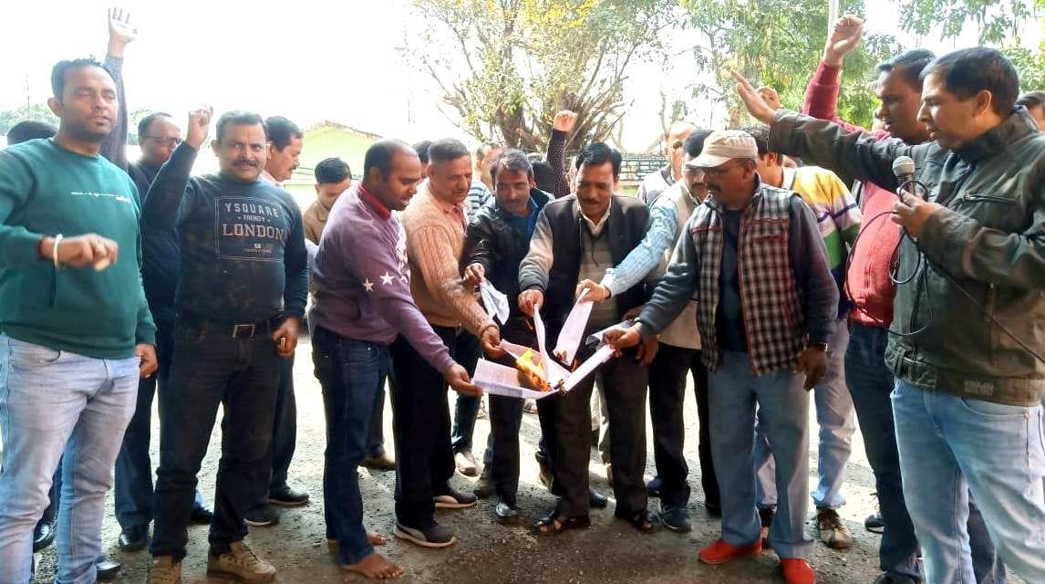Employees burnt copies of mandate