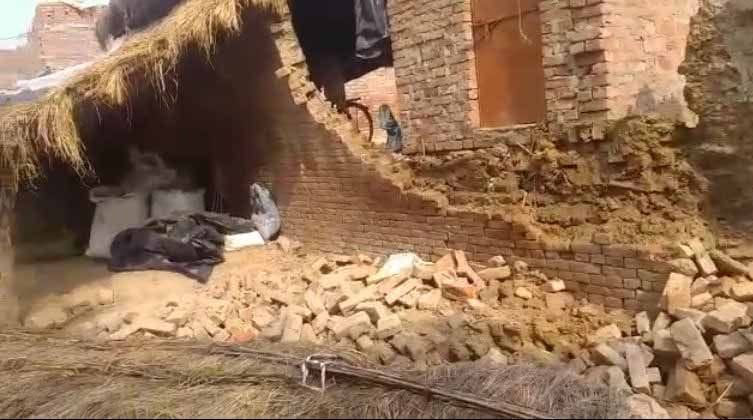 raw house colapses, mother and son injured in debris