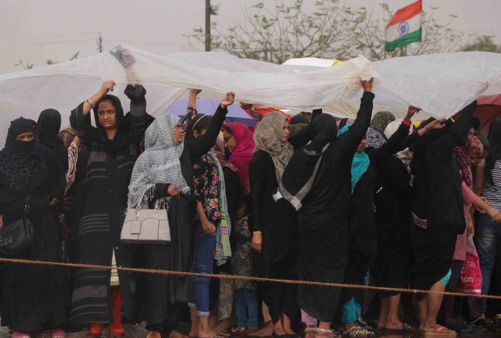 Women protest continue even during rain on Ghantaghar   in Lucknow.