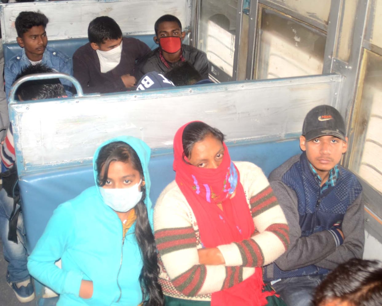 Riding Delhi wearing masks in trains and buses