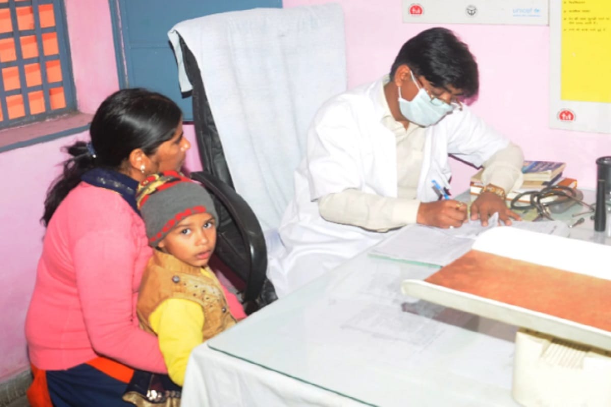 Physicians treating patients with masks