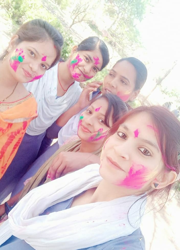 D LED trannee playing holi together put on color