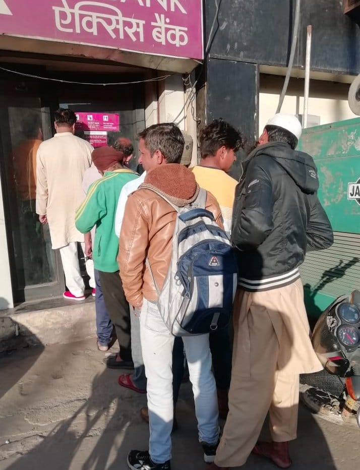 Holiday in banks, queues at ATMs