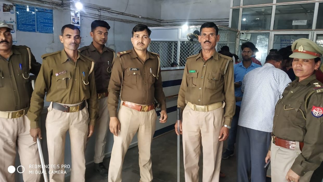 Police assured security by checking the bank in auraiya