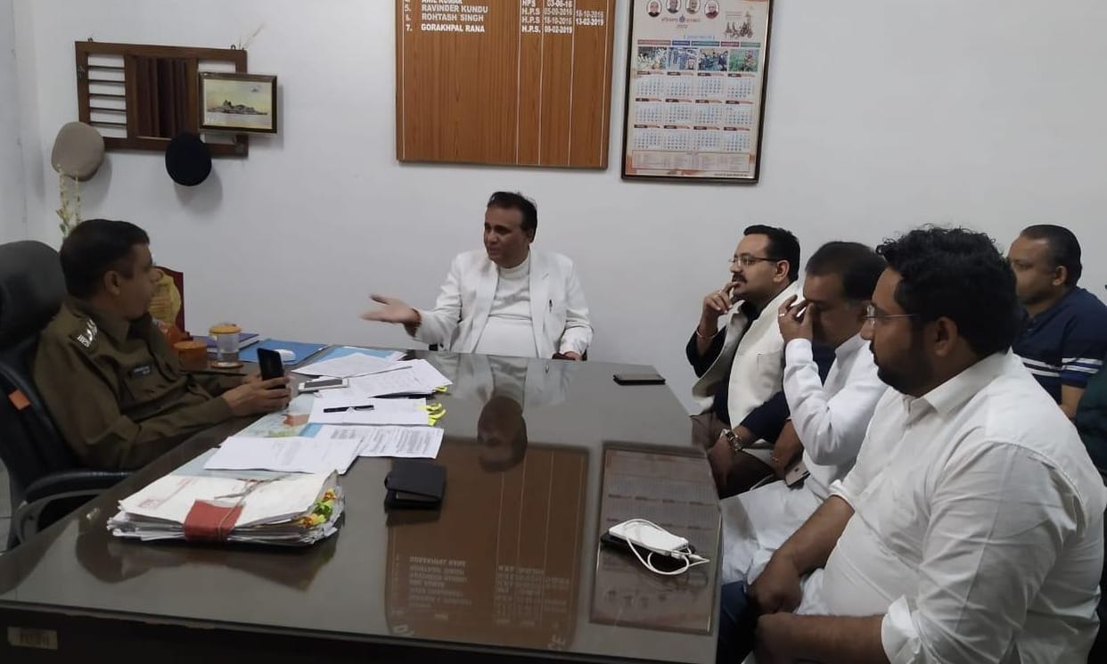 businessman meet police for security