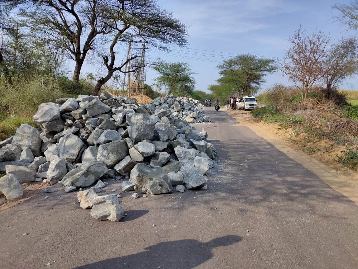 Due to afred of action by RTO Dumper Drivers threw stones on road