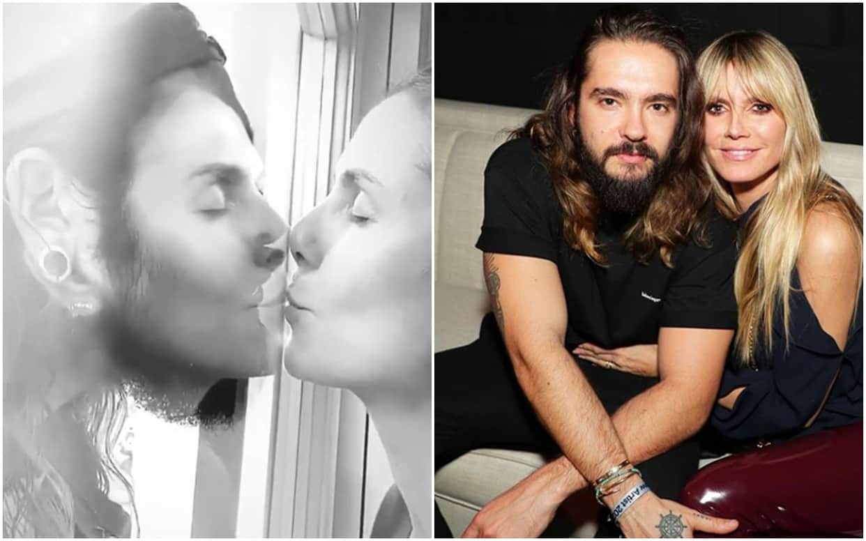 Heidi Klum kissing husband Tom Kaulitz through a glass window await coronavirus test results