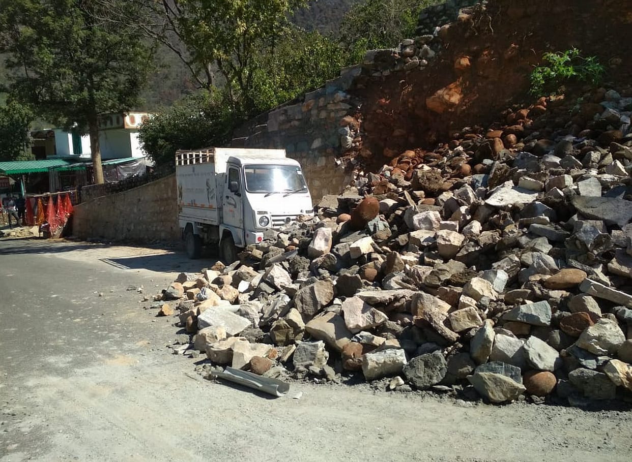 retaining wall collapses along highway, rural injured