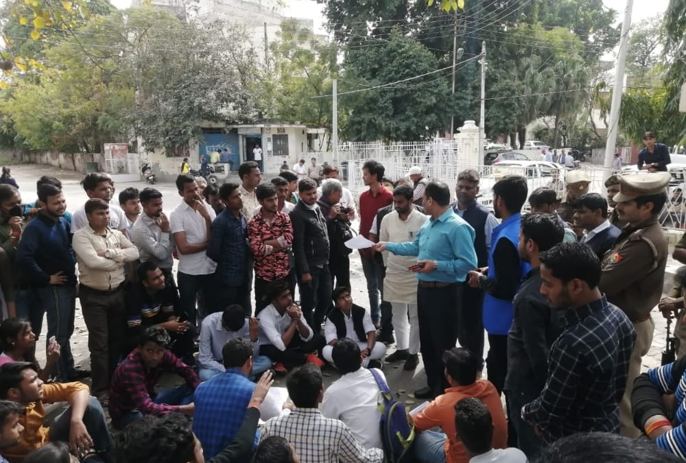 Lucknow University students protest on evaluation of their answer sheets.