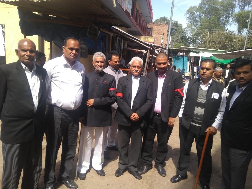 Advocates on strike wearing red band