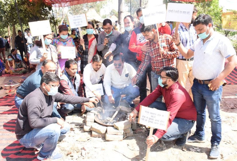 Striking General-OBC employees wearing masks