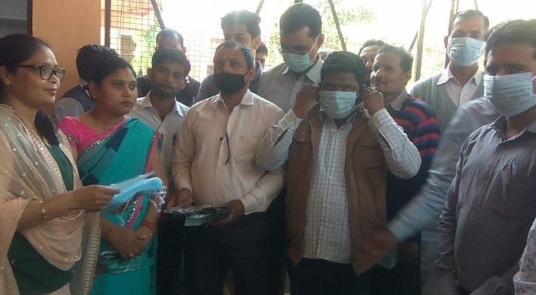 Distributed masks to tehsil employees