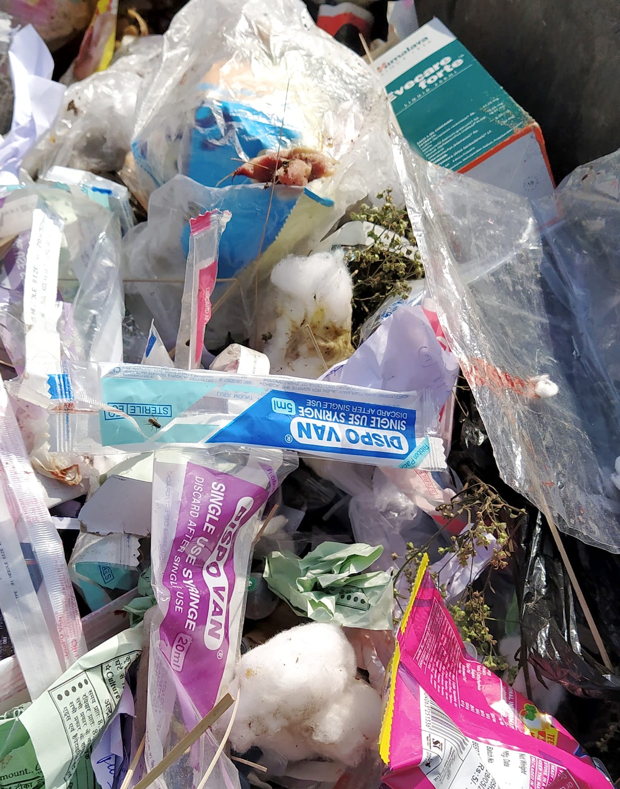 Medical waste of hospitals being thrown in garbage
