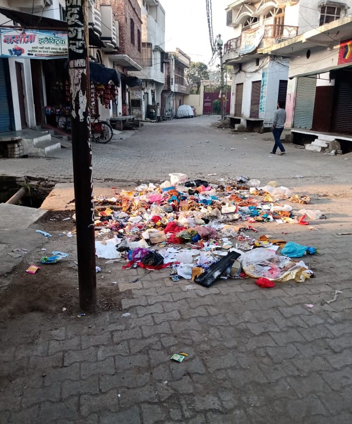 A pile of garbage read near the temple