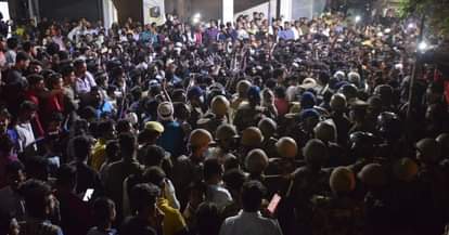 a group of women adamant on standing  officers stayed  till late night