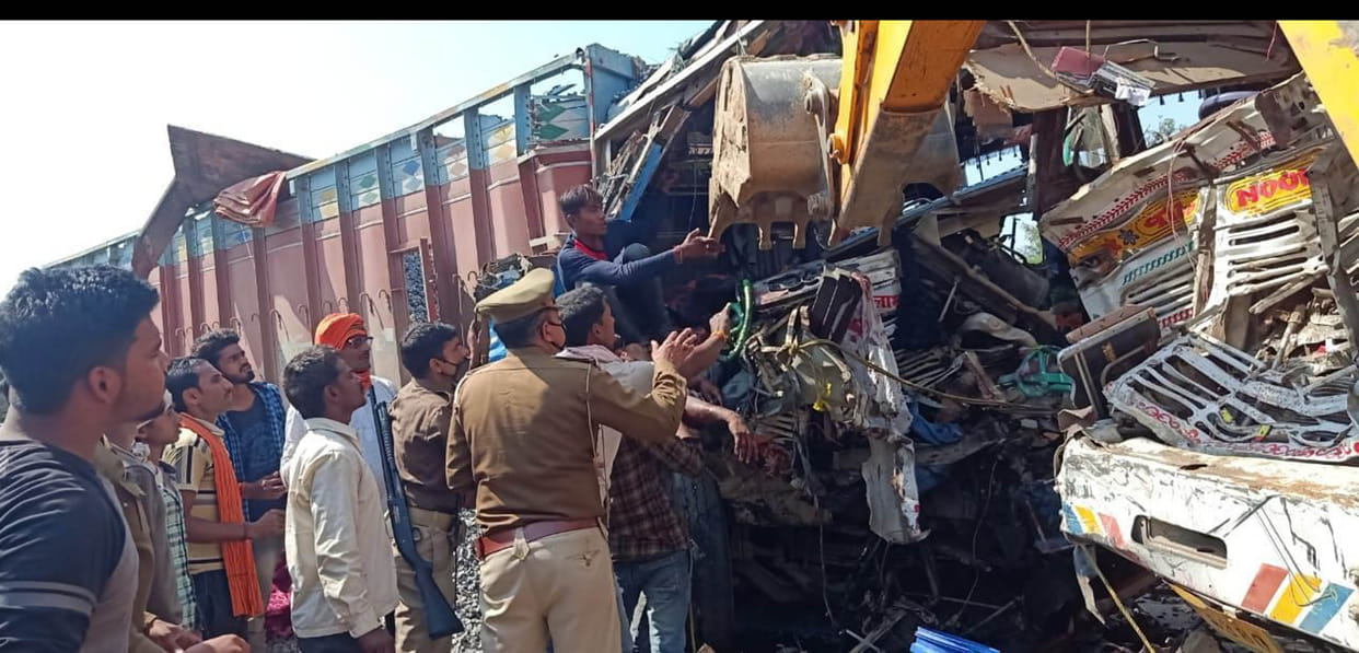 Driver killed in truck collision, three injured